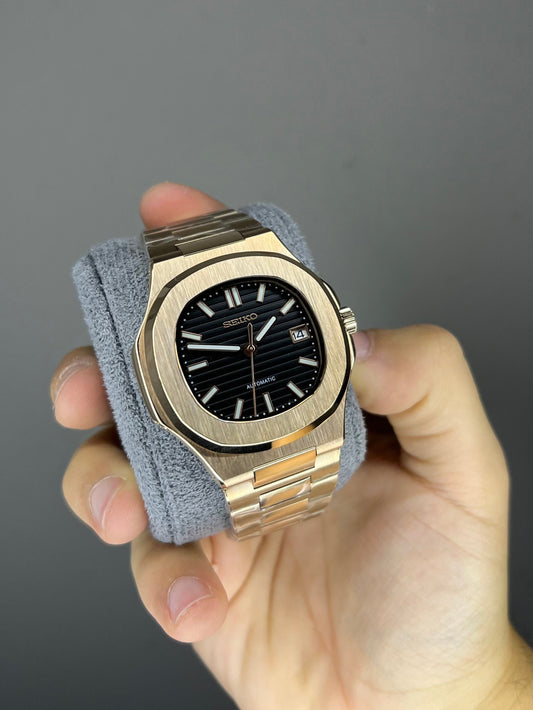 Custom Nautilus rose gold date