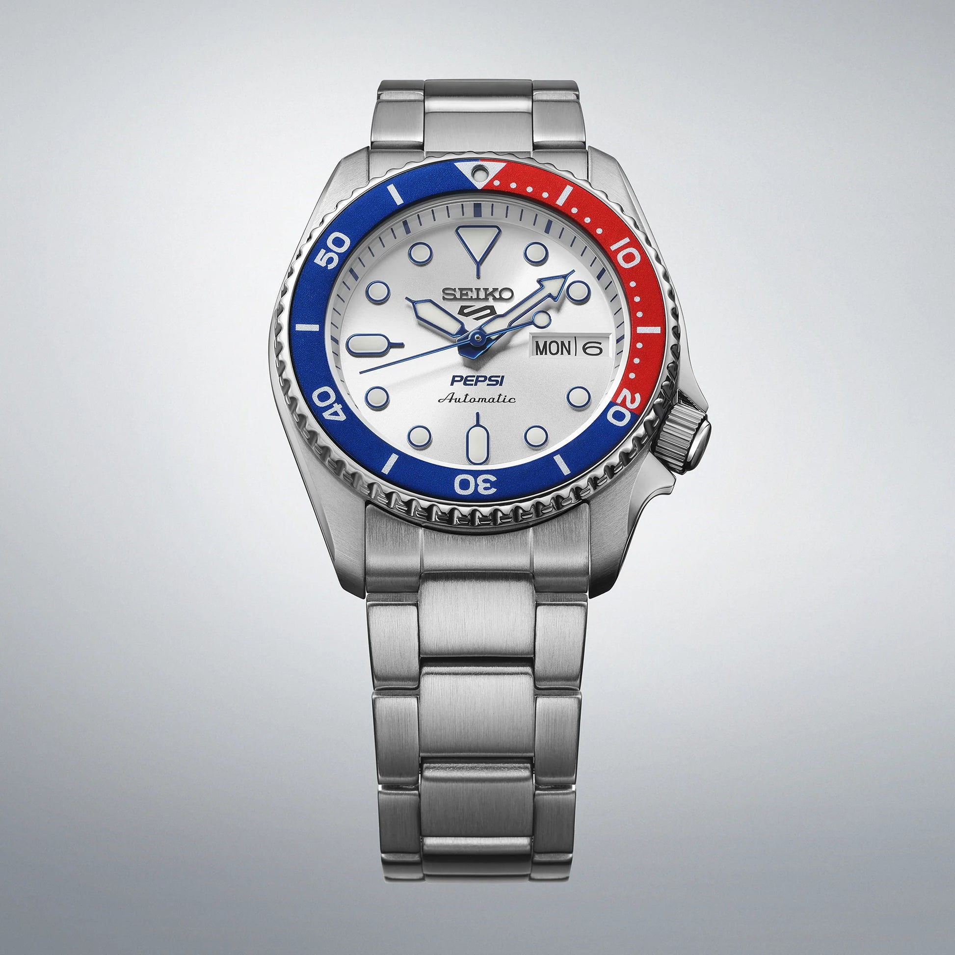 Seiko 5 Sports SRPL99K1 automatico 38mm quadrante argento Pepsi acciaio