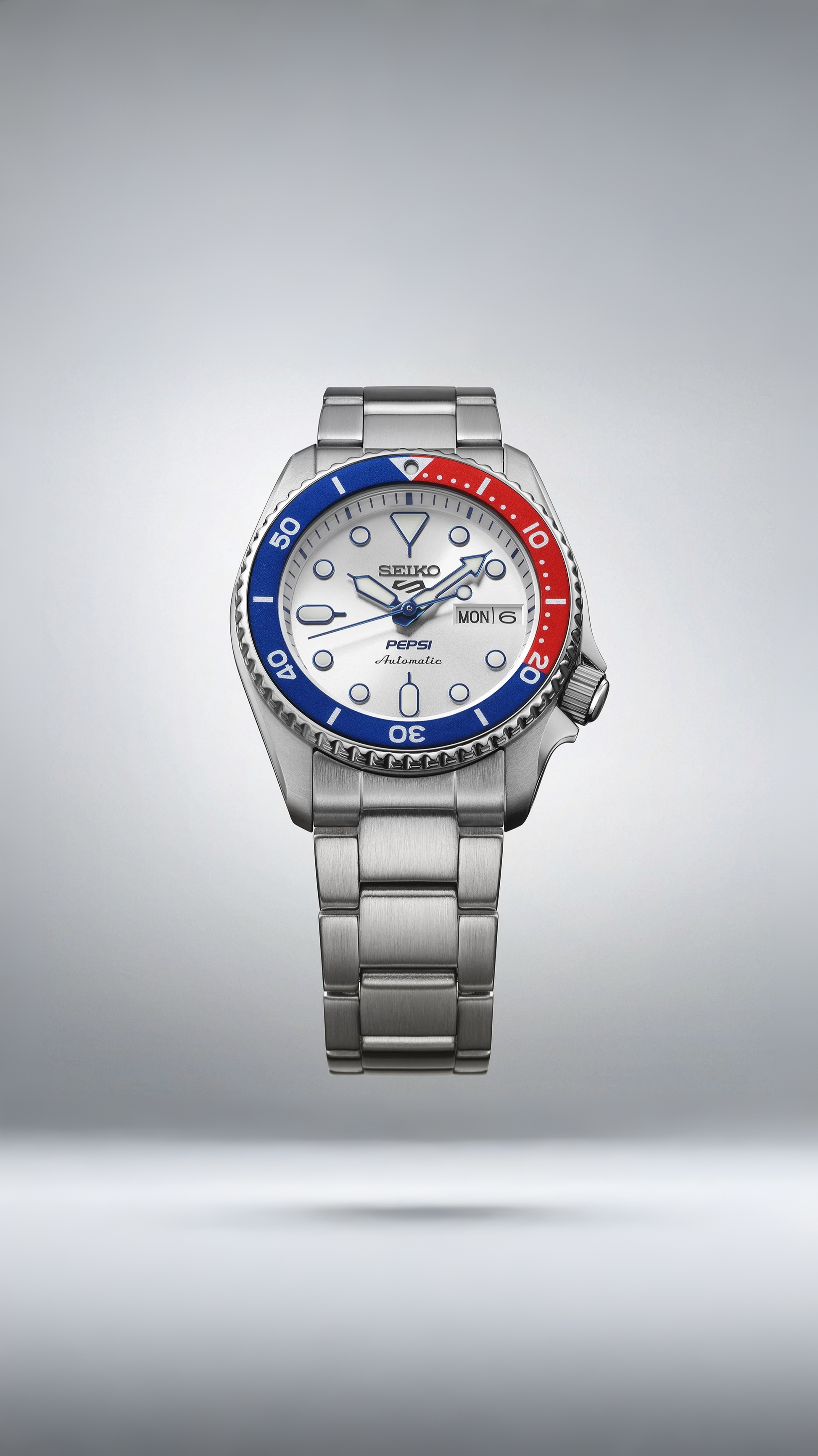 Seiko 5 Sports SRPL99K1 automatico 38mm quadrante argento Pepsi acciaio