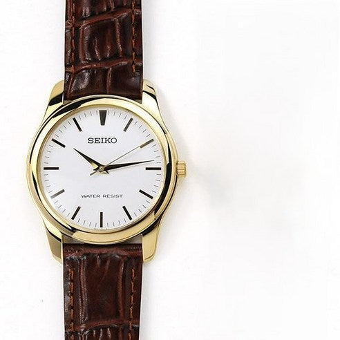 Seiko Spirit SCXP032 orologio uomo quarzo con quadrante bianco, cassa dorata da 35 mm, vetro Hardlex e cinturino in pelle marrone.