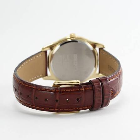 Seiko Spirit SCXP032 orologio uomo quarzo con quadrante bianco, cassa dorata da 35 mm, vetro Hardlex e cinturino in pelle marrone.