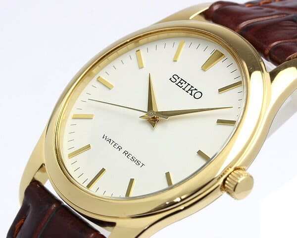 Seiko Spirit SCXP032 orologio uomo quarzo con quadrante bianco, cassa dorata da 35 mm, vetro Hardlex e cinturino in pelle marrone.