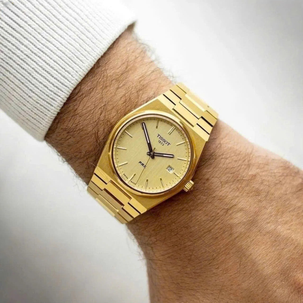 Tissot PRX 40mm quarzo Swiss Made oro quadrante champagne T137.410.33.021.00 bracciale acciaio PVD oro