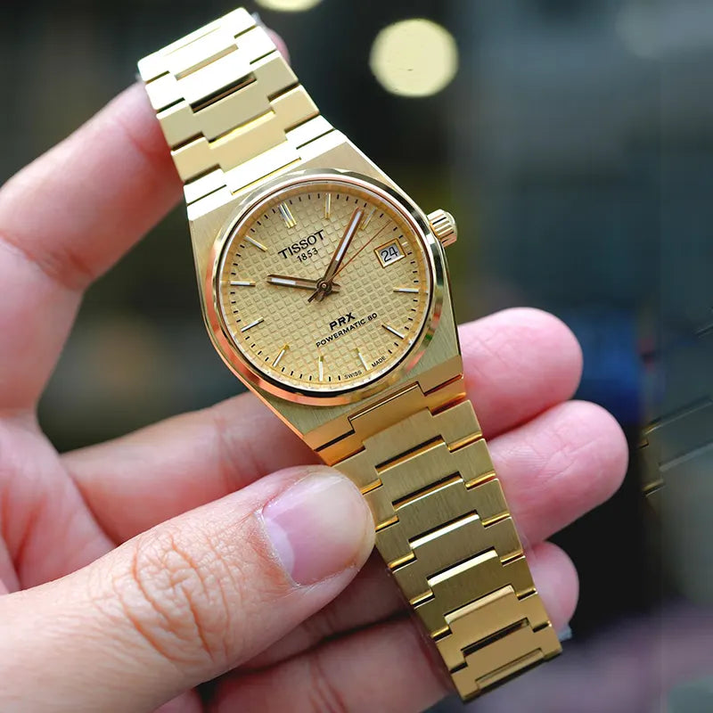 Tissot PRX Powermatic 80 automatico oro 35mm quadrante champagne T137.207.33.021.00